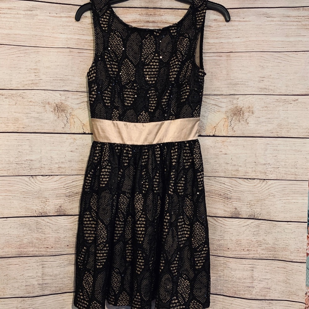 Girls black and gold sequined laced design dress